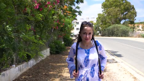 woman walking on a sunny day