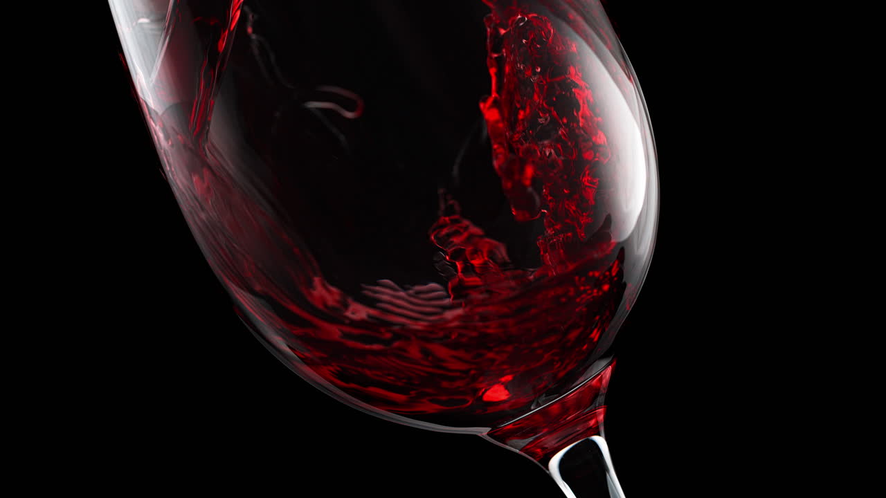 Red Wine Pouring And Swirling At The Bottom Of A Crystal Glass In Slow Motion