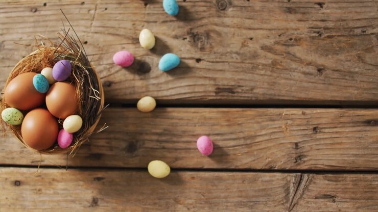 Video of decorated colorful easter eggs on a wooden surface