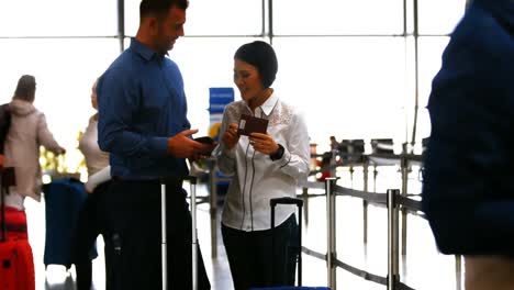 male and female commuter interacting with each other