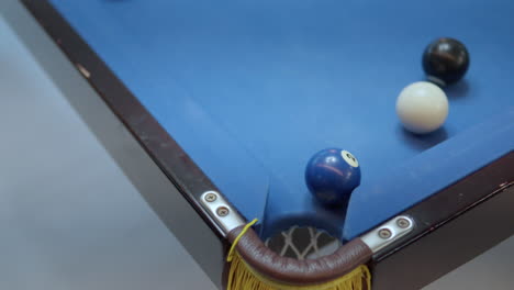 Pool-Pocket-Close-up---Amatuer-Player-Misses-Chance-to-Make-Easy-Strike-Goal---Billiard-Balls-Bounce-Near-the-Hole-Not-Entering