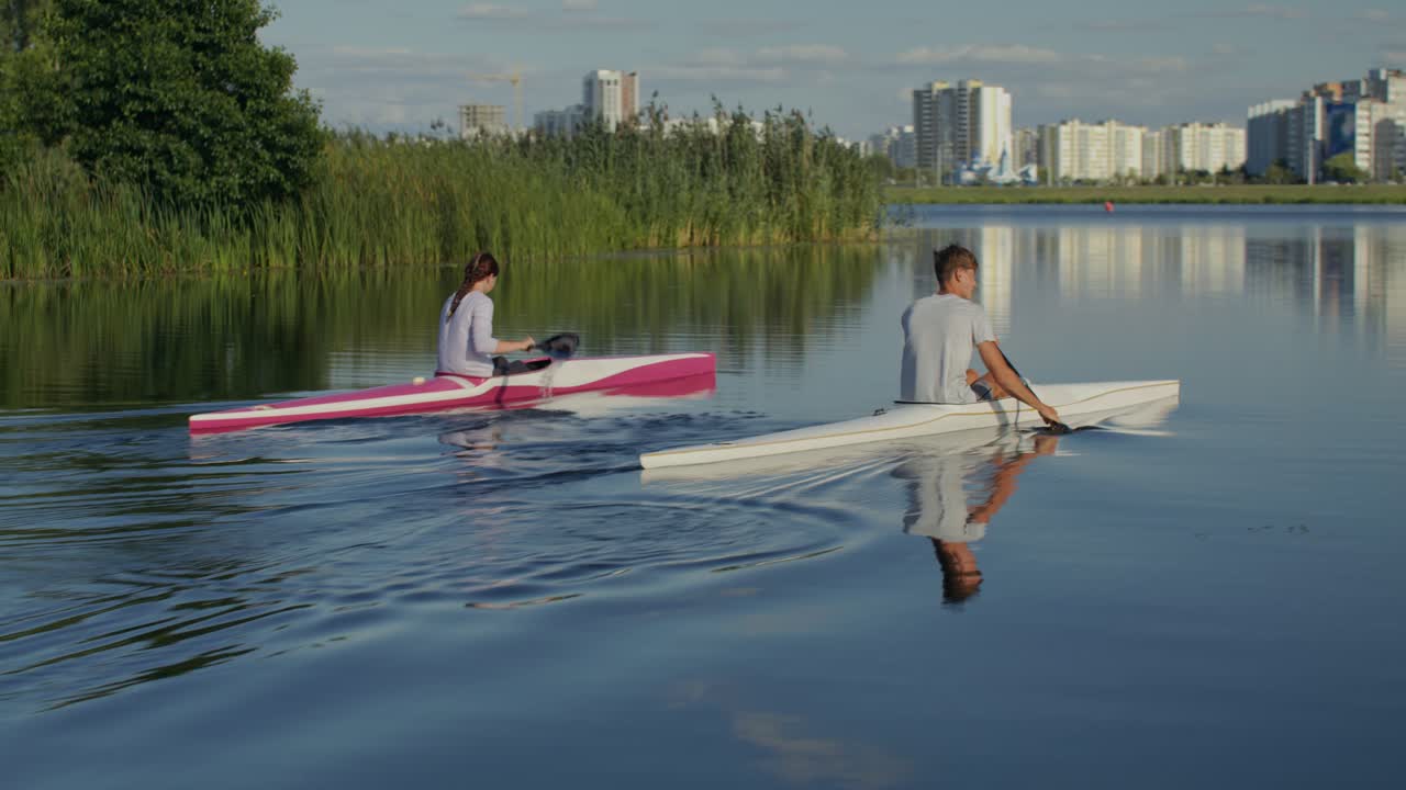 People Canoeing on a Lake