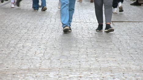 concept crowd feet with shoes closeup