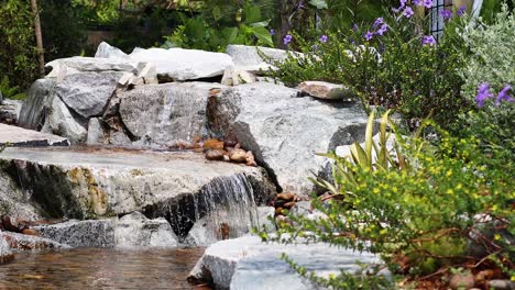 a serene waterfall surrounded by lush greenery