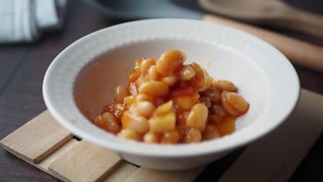 close-up of a bowl of baked beans