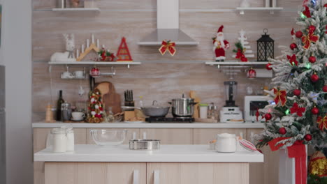 empty xmas decorated culinary kitchen with nobody in it is ready for traditional christmas celebration