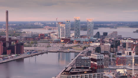 Aerial-dolly-toward-Sompasaari-and-Kalasatama-waterfront-districts-in-Helsinki