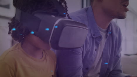 animación de puntos en movimiento sobre padre e hijo biraciales usando auriculares vr.