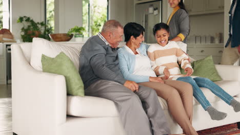 grandparents, parents or child watching tv in home