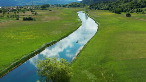 croatia in summer, aerial view of kayaks on gacka river in countryside