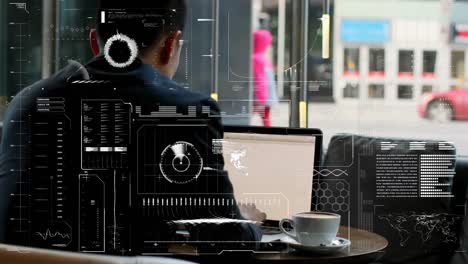 Animation-of-hud-interface,-rear-view-of-asian-businessman-working-on-laptop-with-coffee-at-cafes