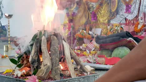 yajna, a ritual done in hindu worship where wood is set on fire with holy oil and ghee