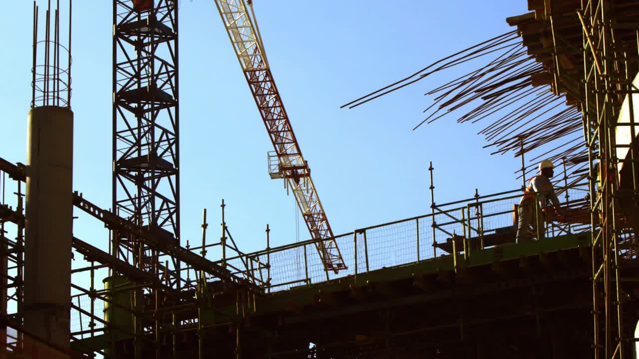 HUD overlay appearing and updating drawing focus as workers checking rail and climbing for safety