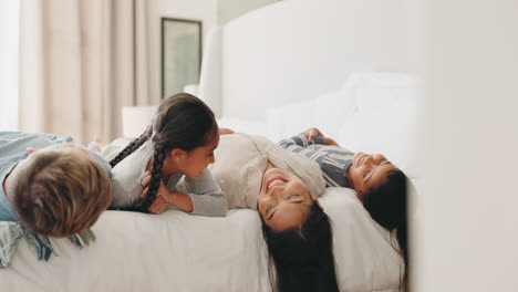 Relax,-smile-and-morning-with-family-in-bedroom