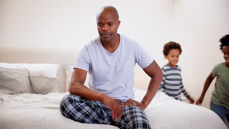 stress, father and kids running in home bedroom