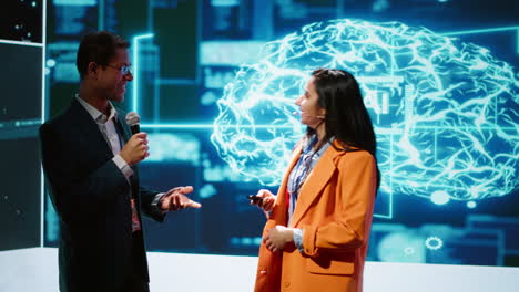 presenter and guest chatting during ai summit discussion panel