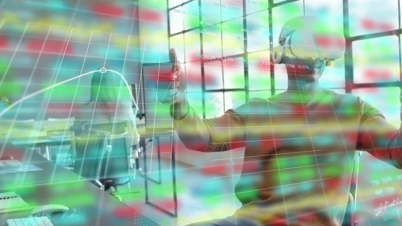 Man with VR headset raising hands and manipulating overlay charts in tech office, analyzing metrics