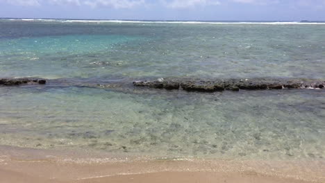 Reef-and-water-surface,-clear-and-crystalline