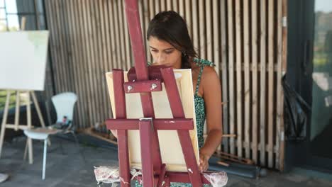 woman painting outdoors