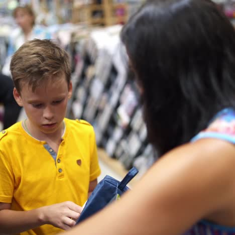 boy choosing school stationery