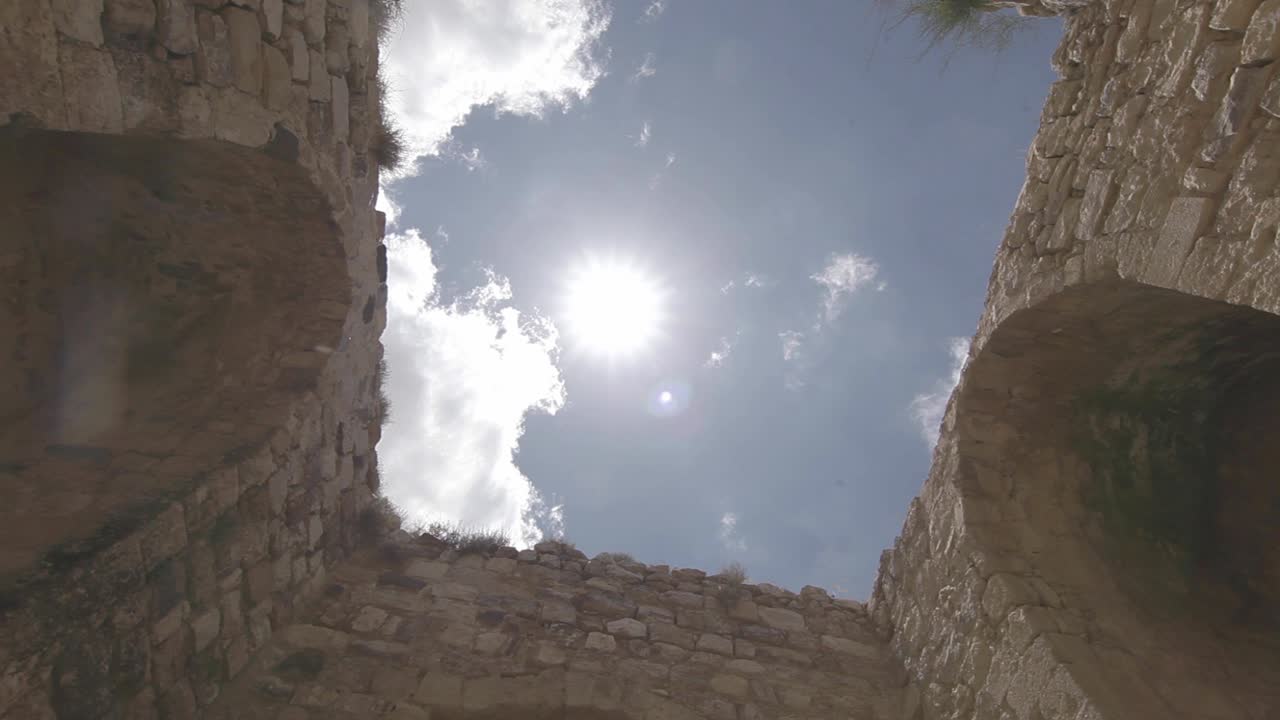 Time-Lapse clouds, ancient ruins, Jordan, static shot, low angle