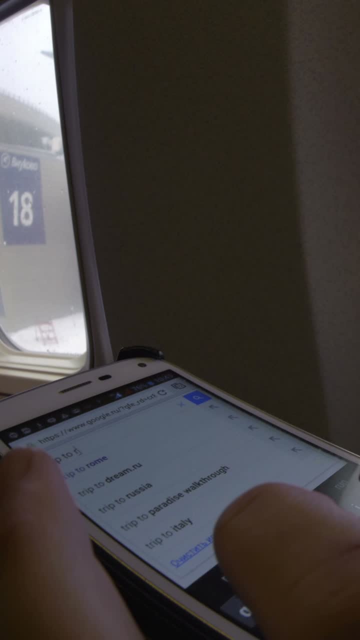 Browsing travel options on a smartphone during a trip