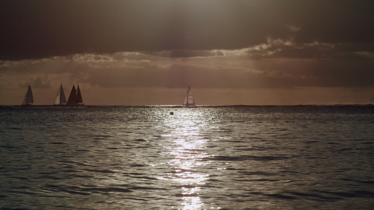 Sailboats on the Ocean at Sunset