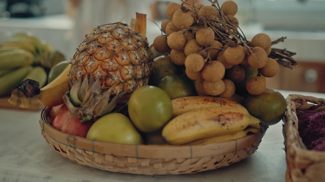 Assorted Tropical Fruits in a Basket
