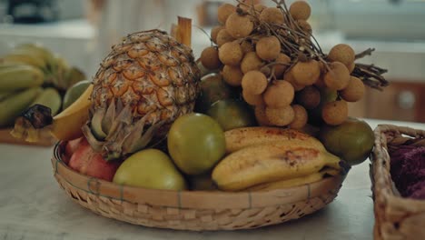 assorted tropical fruits in a basket
