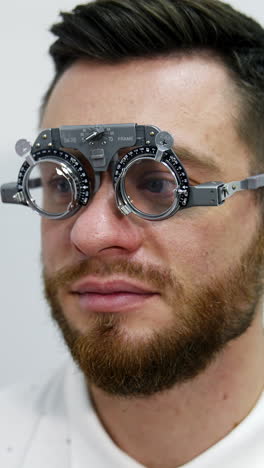 man undergoing an eye exam