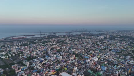 footage of twilight over north chennai, where urban life meets port activity