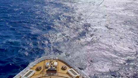 Watching-the-bow-of-a-cruise-ship-travel-through-relatively-calm-waters