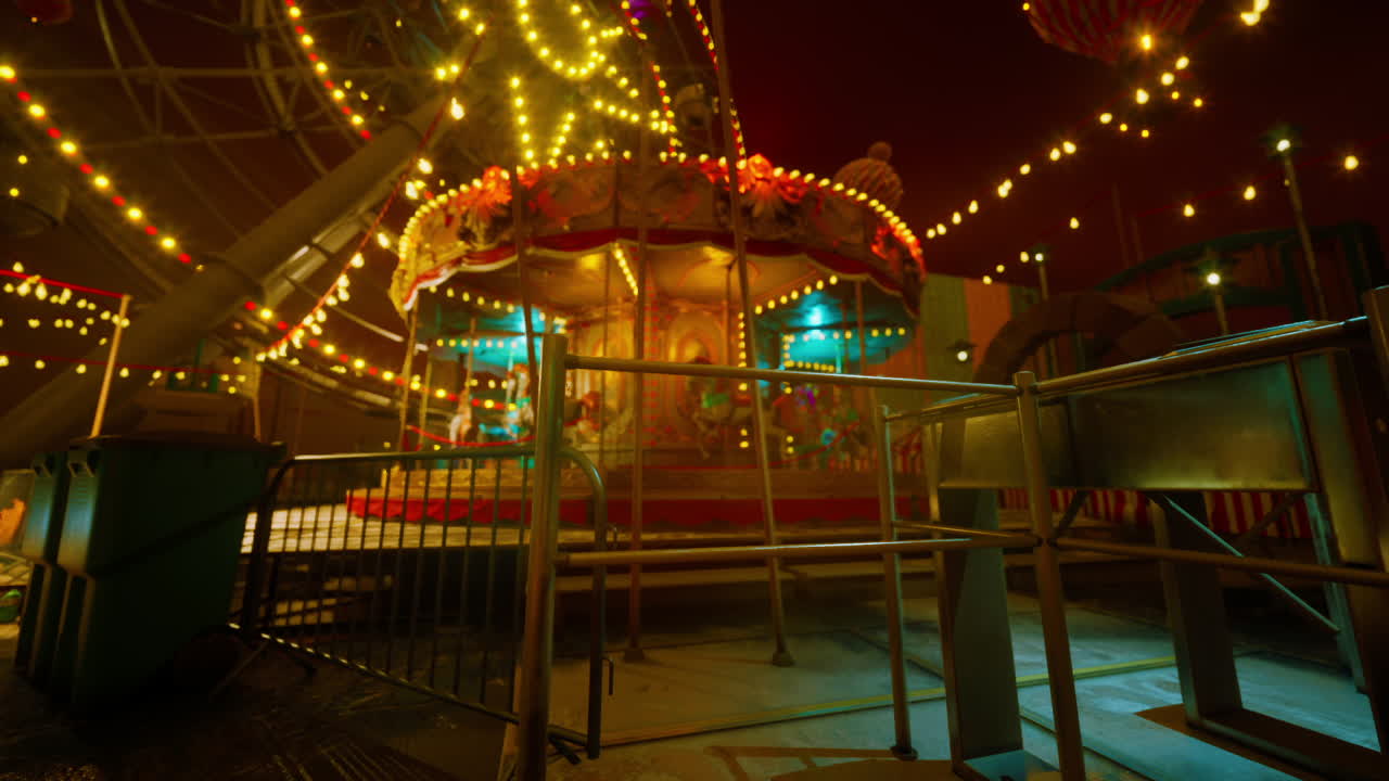Empty amusement park at night with illuminated rides and quiet atmosphere