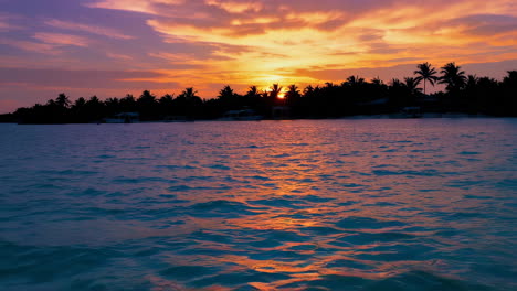 sunset over tropical island paradise