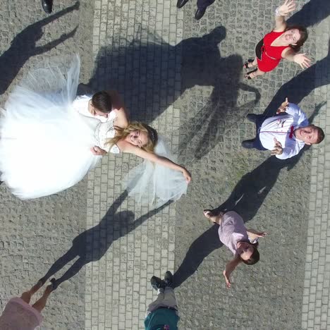 newlywed couple and their friends