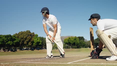 batsman hitting a ball during cricket match