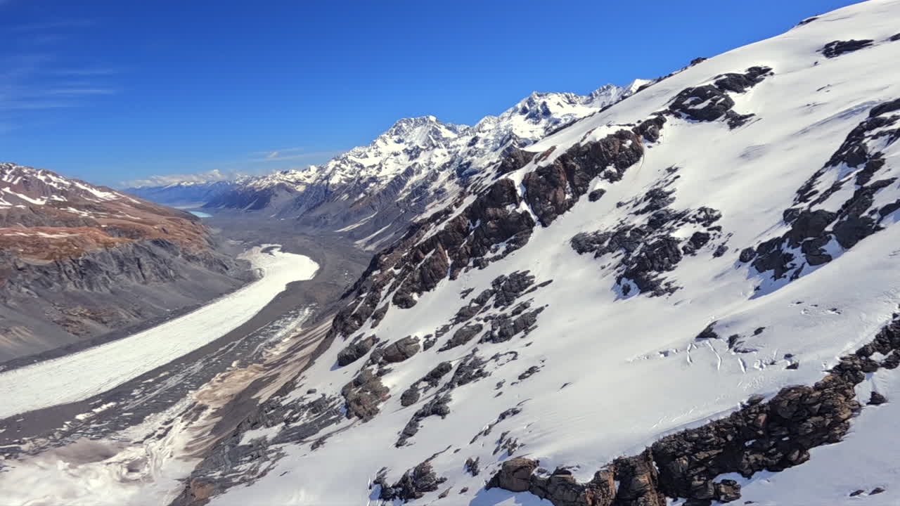 Flying down from the Tasman Glacier towards the Tasman lake, New Zealand