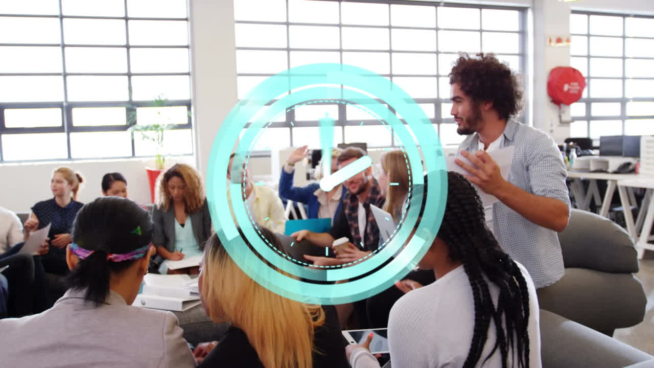 Animation of clock over diverse male and female business colleagues having meeting in office