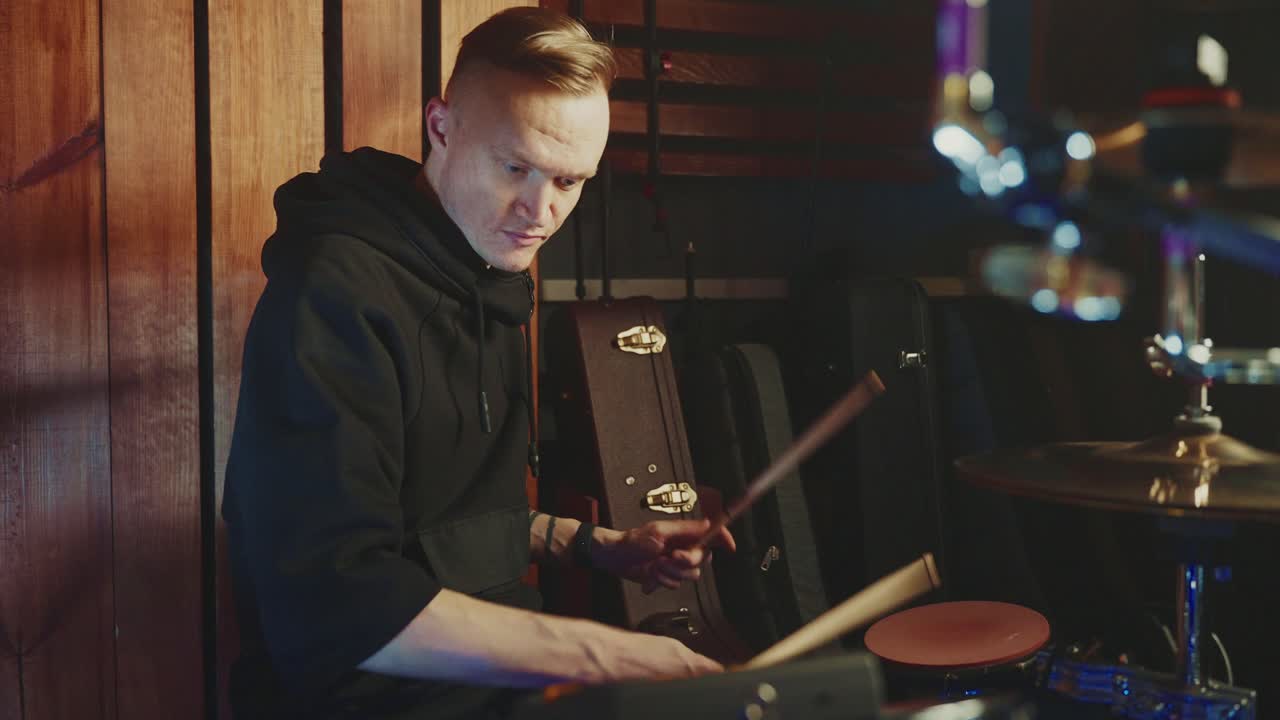 Drummer Playing in a Recording Studio