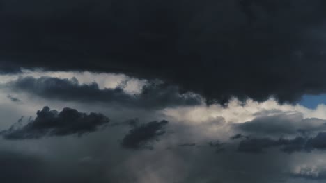 background of dark dramatic sky with stormy clouds timelapse before rain or snow, extreme weather