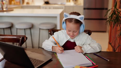girl drawing at home