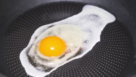 slow motion the egg is broken into a pan and fried 4k 2025 07 24 06 53 22 utc.mov | black, break, breakfast, breaking