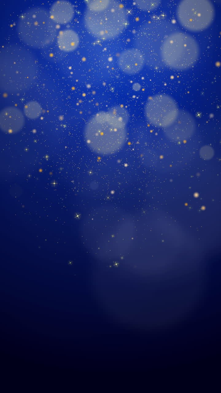 Gold sparks glitter special light effect. Glow sparkles on dark blue night background. Christmas abstract pattern. Sparkling magic dust particles. Loop animation. Vertical video.