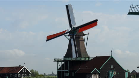 fantastic shot of a windmill in a summer landscape in the netherlands