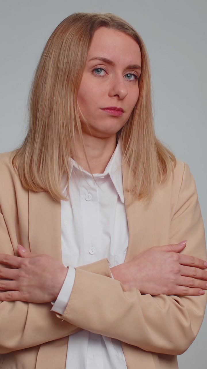 Confused irritated businesswoman pointing fingers herself rejection refusal stop shock sign