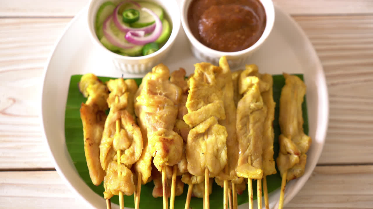 Pork satay - Grilled pork served with peanut sauce or sweet and sour sauce