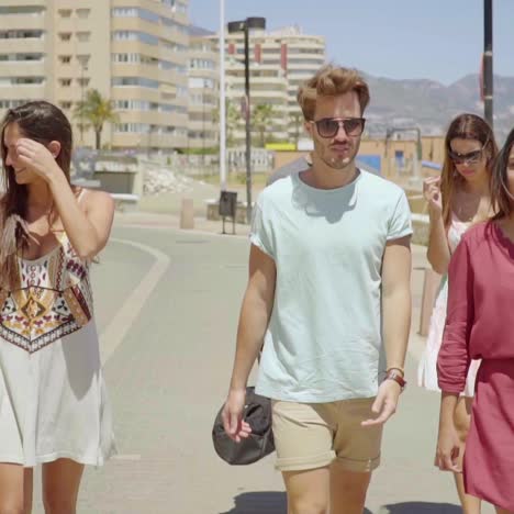 group of trendy young tourists out sightseeing