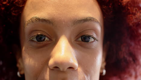 close-up of person's face, making it difficult to describe for creative writing business