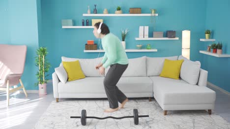 funny man at home injures his ankle while jogging.