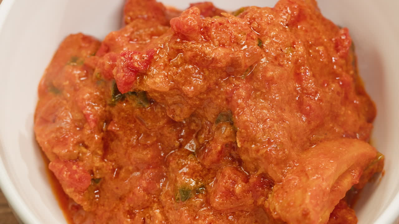 Close-up of Delicious Butter Chicken in a Bowl